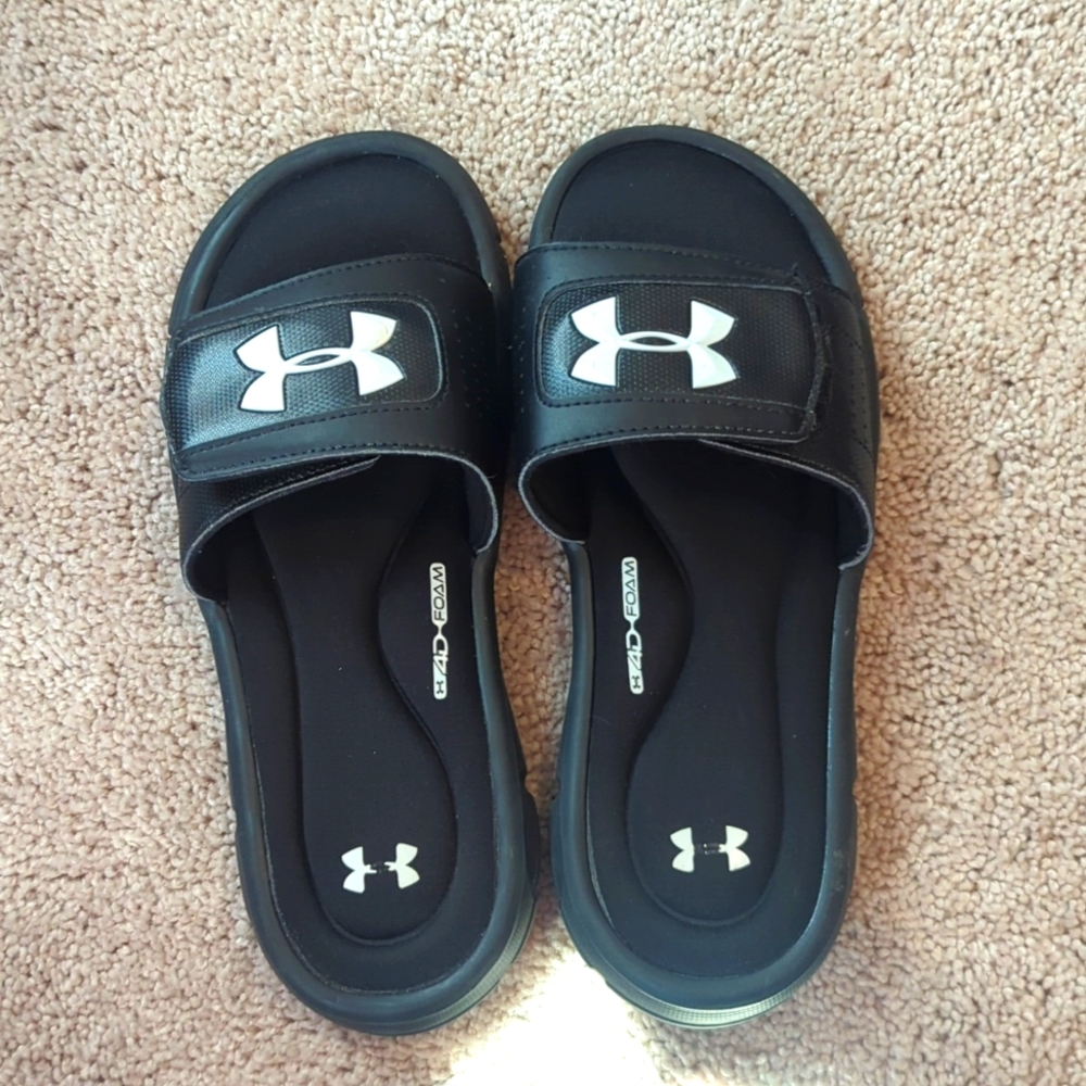 Under Armour black youth slides